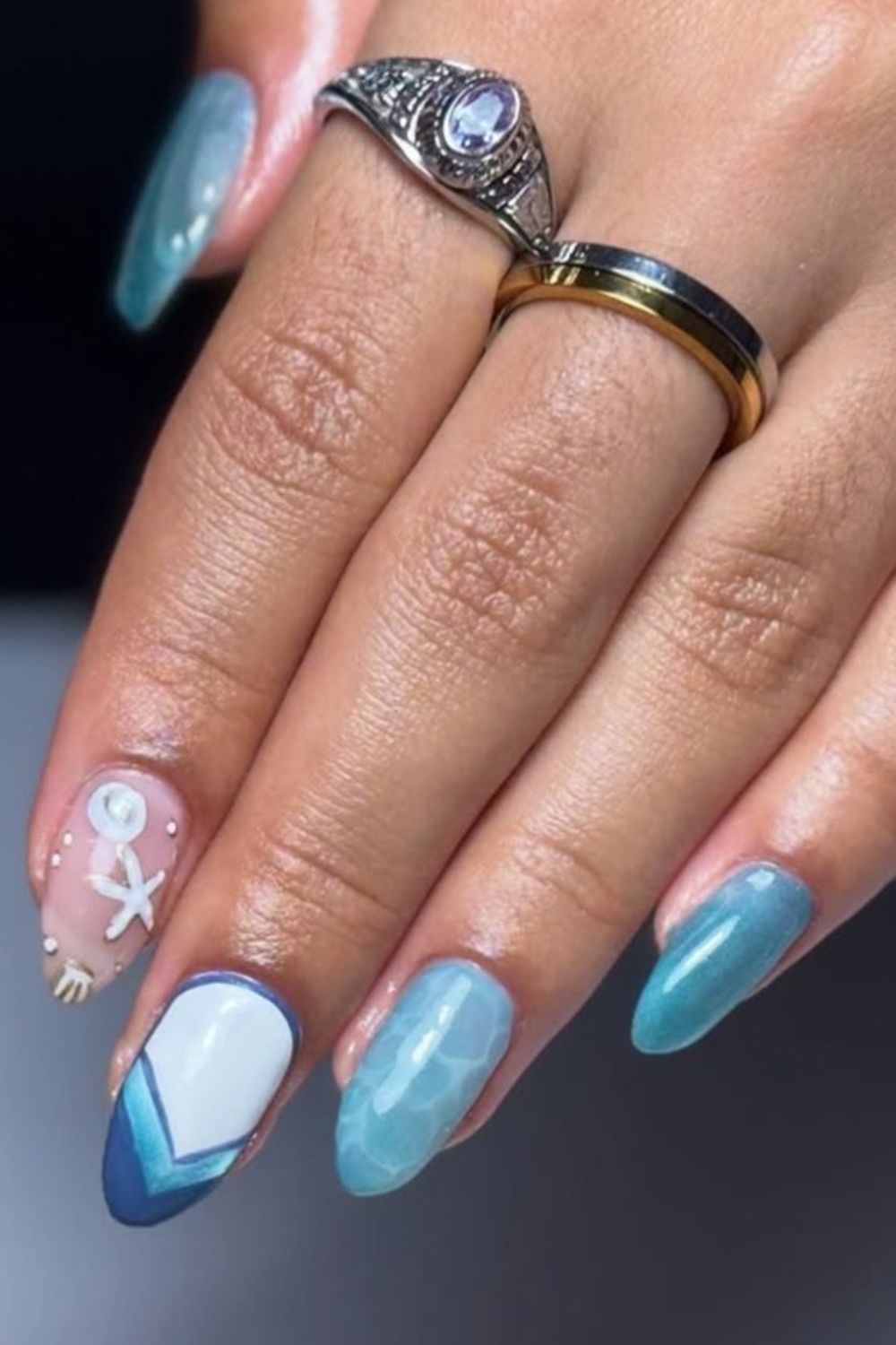 Are you looking for the best Summer Nails 2025 ideas? Check out this cool blue and white design with beach art! See 43 amazing summer nail ideas for every skin tone!