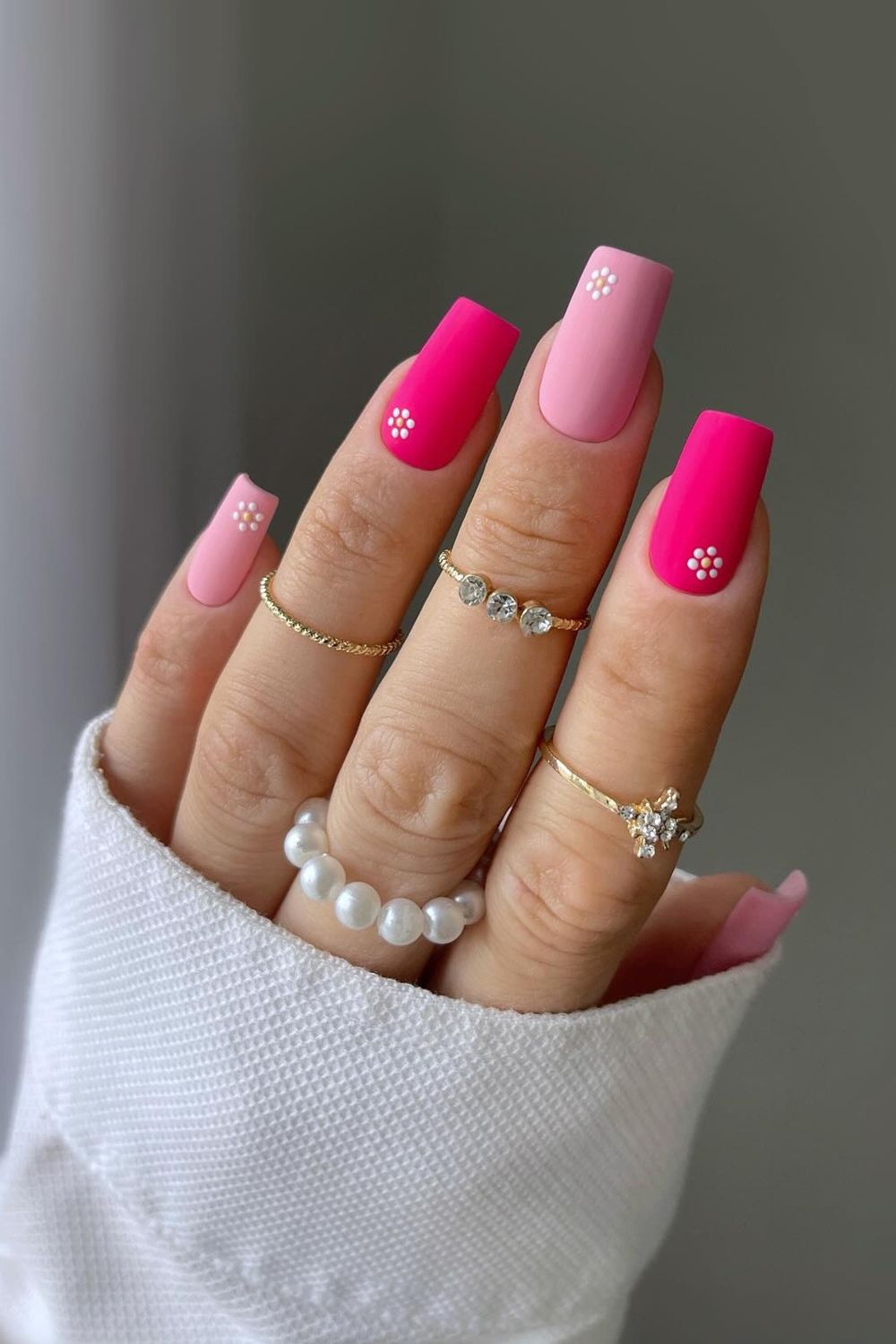 Looking for pink nails? Explore these cute pink nails white flower designs for a fresh look!