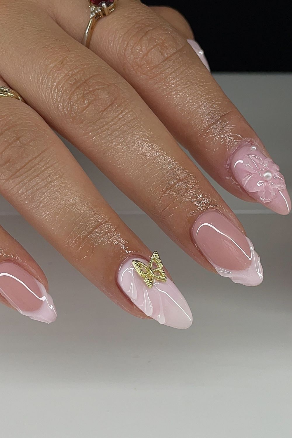 Looking for elegant pink nail designs with butterflies and flowers? Explore these beautiful nails and discover your next manicure inspiration for 2025! Click here for more pink nail ideas.