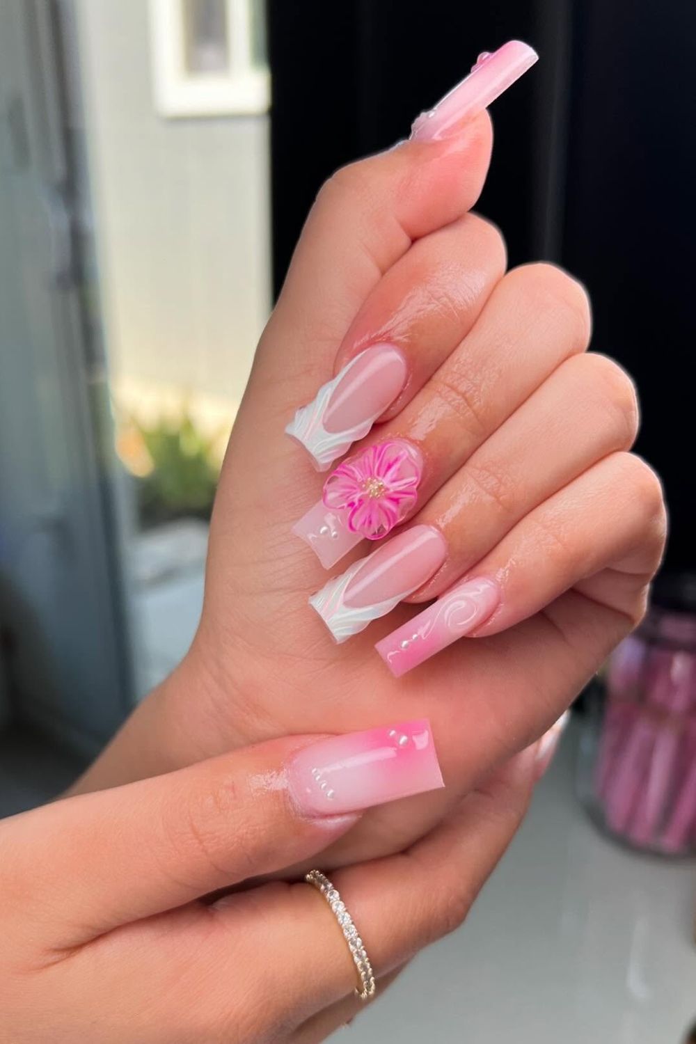 Obsessed with pink nails? Check out these stunning pink nails with white tips and a flower accent! Discover more pink nail ideas for 2025 and elevate your style today!