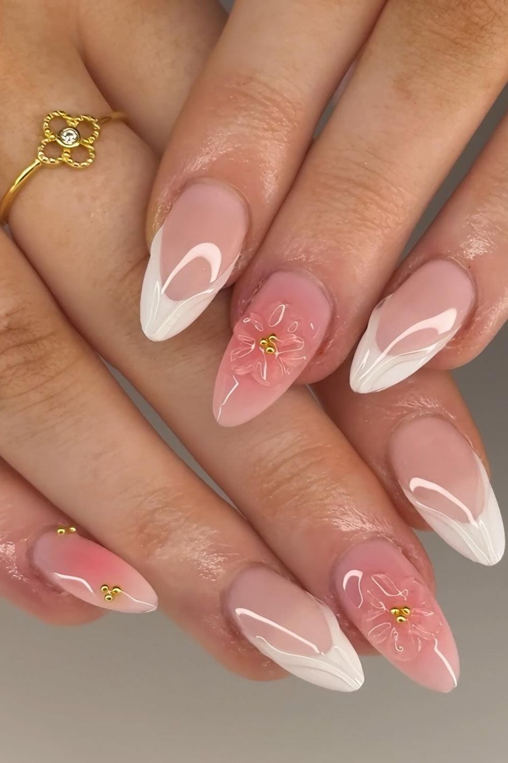 Chic pink nails white tips flower accents 2025 trendy look