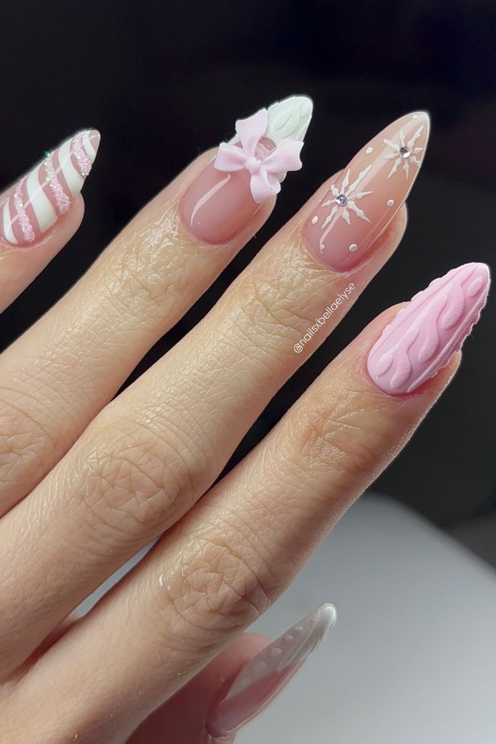 Want stunning pink nails? See luxury pink nails with bows, snowflakes, and more for 2025 nail inspo!
