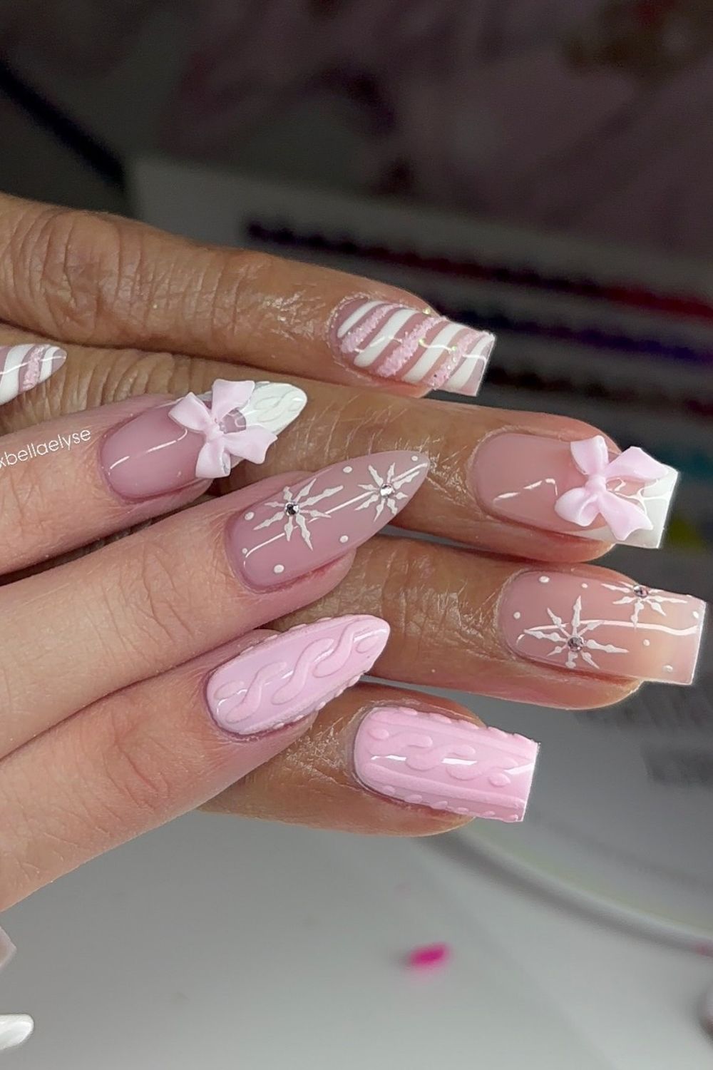 Pink bow snowflake nails 2025.  See more cute pink nail designs now!
