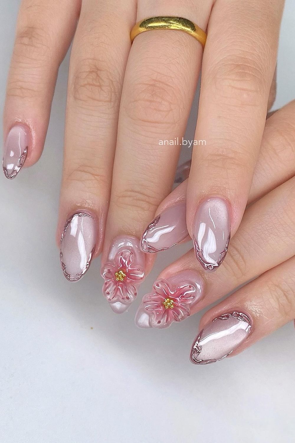 Are you looking for cool summer nails to try in 2025? See our collection full of summer nail ideas for 2025 and get inspired by these pretty pink nails with 3D flowers!