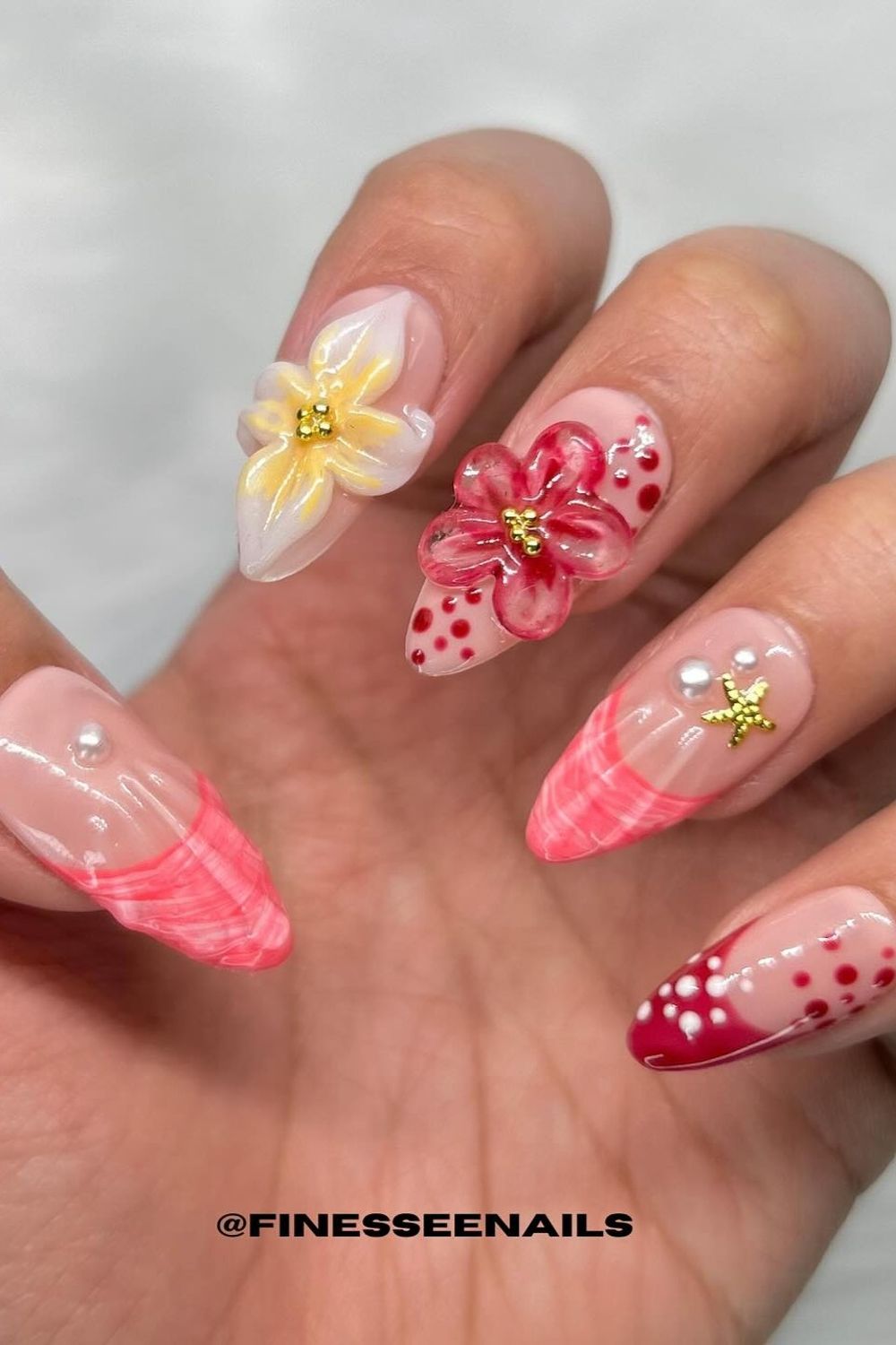 Want amazing summer nail ideas for 2025? Check out this fun nail art with 3D flowers, polka dots, and a cute starfish charm perfect for your summer look.