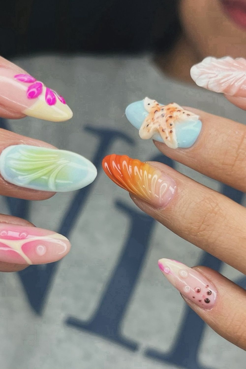 Looking for amazing summer nails for 2025? See these beach-themed 3D nails with starfish and shell designs perfect for any skin tone!