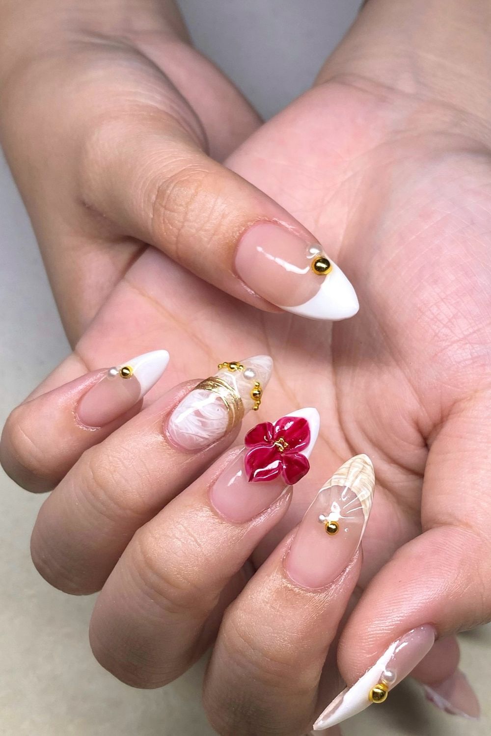 Searching for stunning Summer Nails 2025? Explore our ideas featuring elegant French tips, 3D flowers, gold accents, and pearl details perfect for any skin tone!
