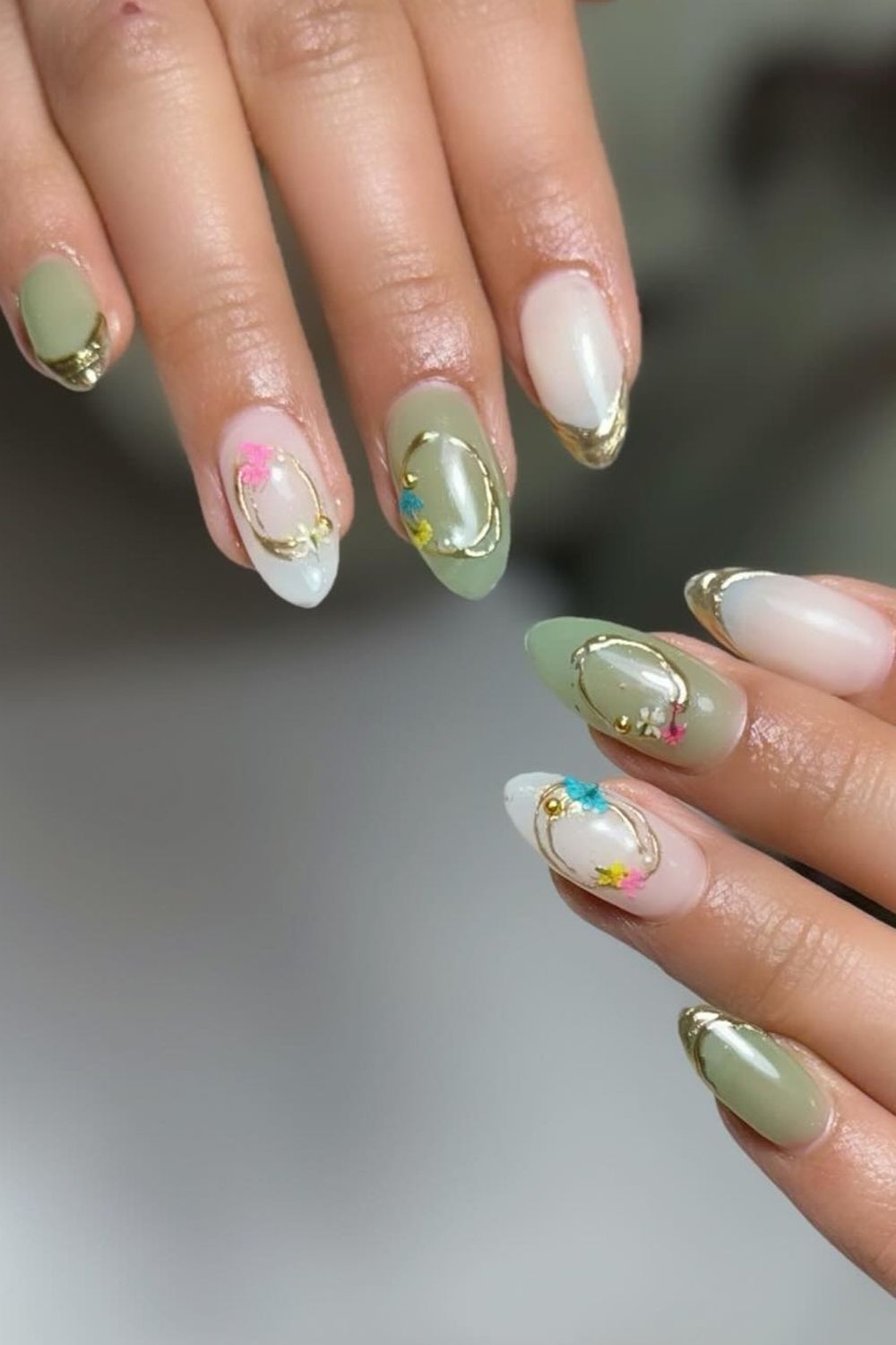Looking for the best summer nails for 2025? See this elegant green and white nail design with gold and flowers. Find lots more summer nail ideas for 2025 in our collection!